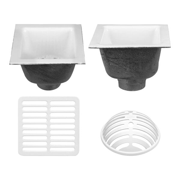 A Zurn Elkay cast iron floor sink with a black and white drain cover over a white sink.