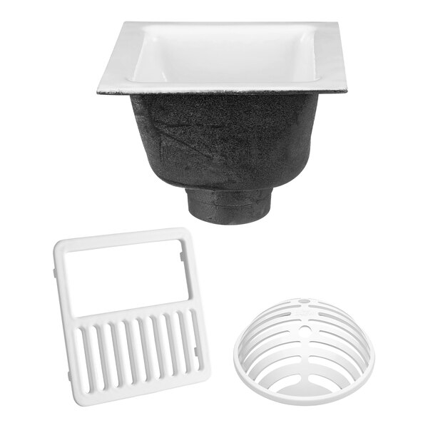 A white Zurn cast iron floor sink with a white plastic drain cover.