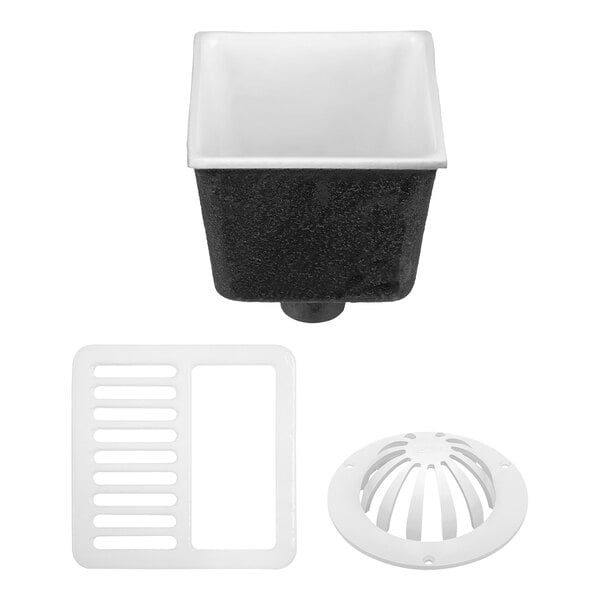 A black and white Zurn floor sink with a drain and grate.