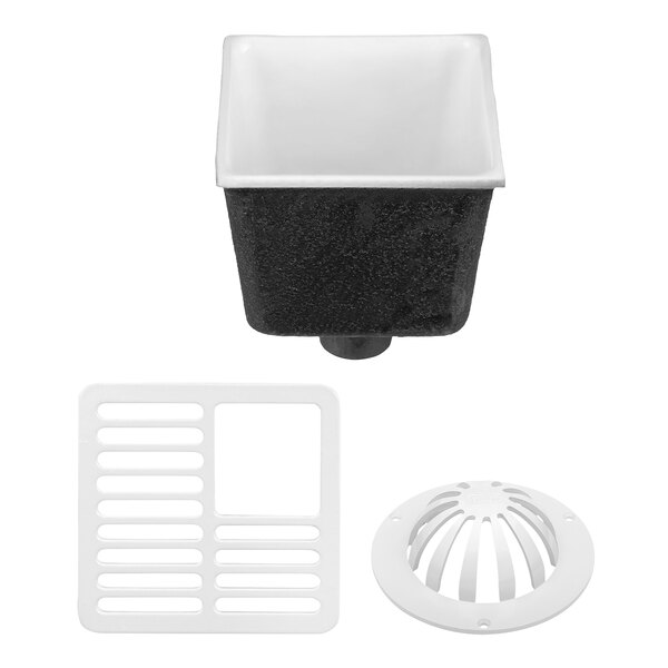 A black cast iron Zurn floor sink with a white grate and drain cover.