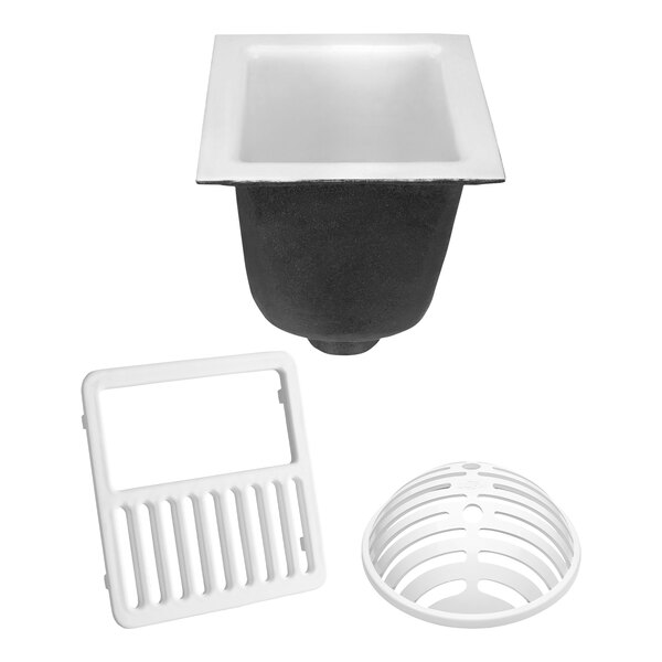 A Zurn floor sink with a black square drain cover with holes.