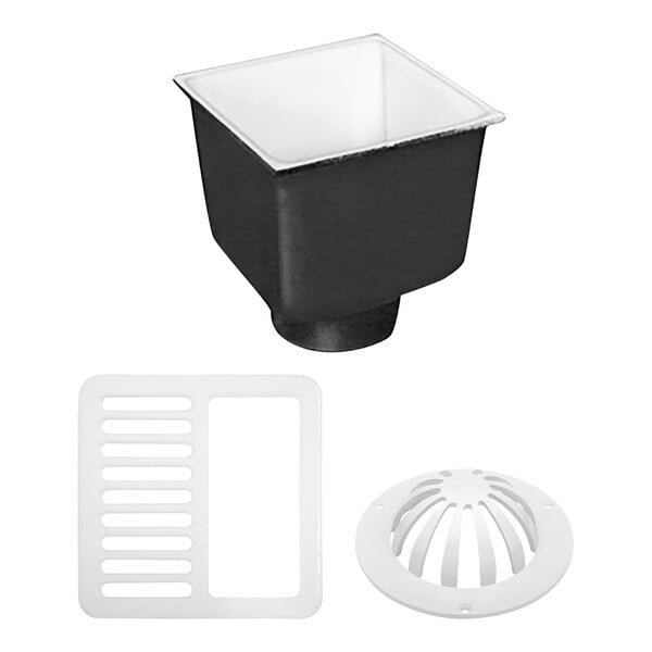 A black square Zurn floor sink with a white plastic drain cover.