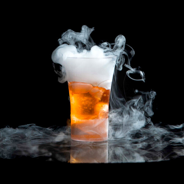 A Flavour Blaster JetChill plastic shot glass with smoke coming out of it.
