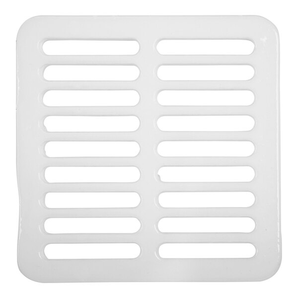 A white enameled cast iron grate with holes for a floor sink.