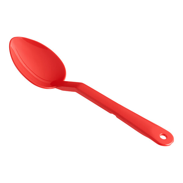 A red polycarbonate salad bar spoon with a long handle.