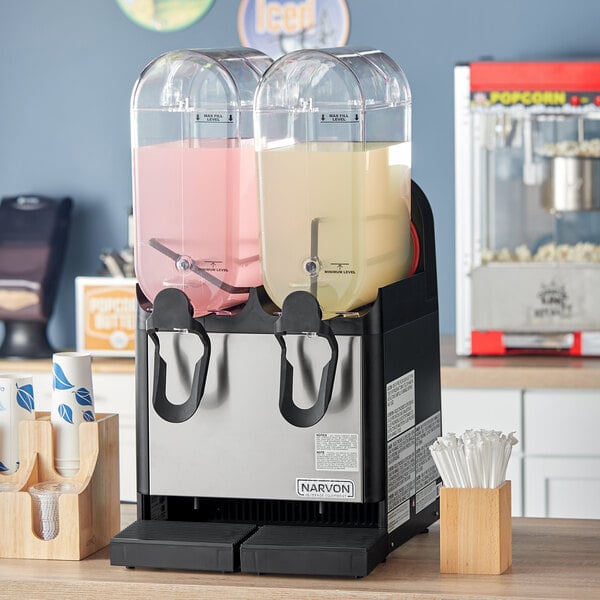 A Narvon refrigerated beverage dispenser with two containers of liquid.