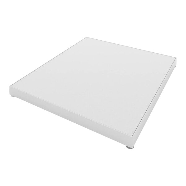 A white square melamine Econoco display platform.