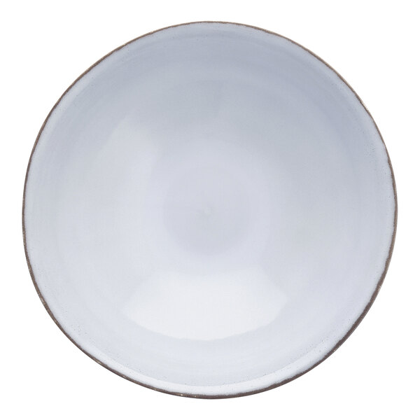 A white stoneware bowl with a brown rim.