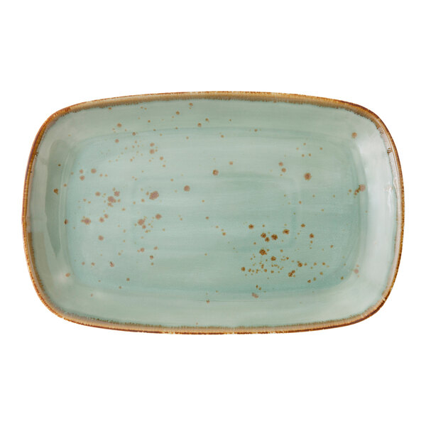 A rectangular white Erthe TechnoCeram platter with brown specks.