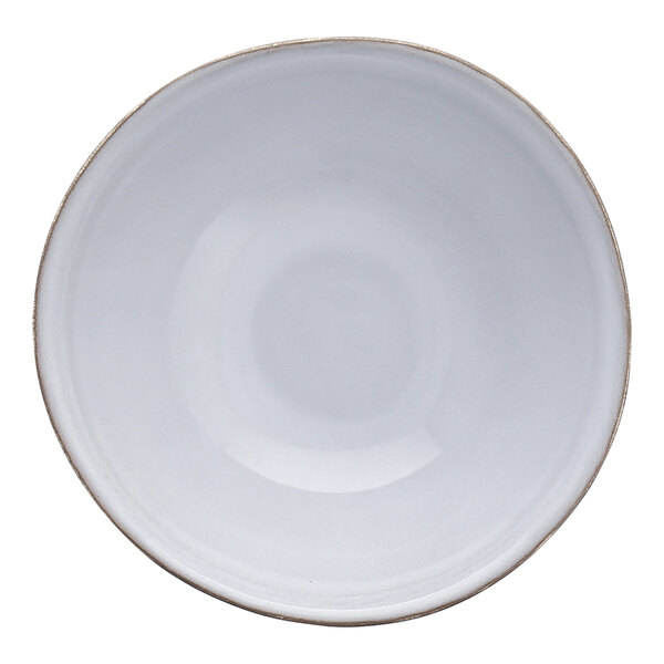 A white bowl with a brown rim.