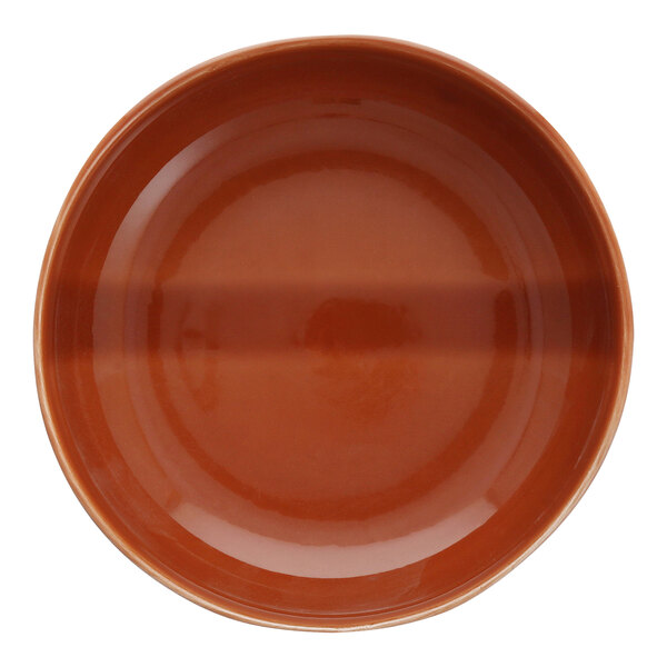 A close-up of a brown Nosse by Fortessa Svelte stoneware bowl.