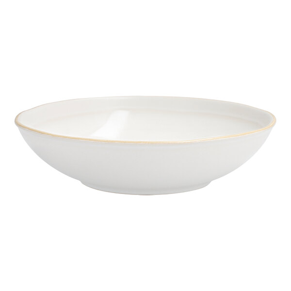 A white Nosse stoneware bowl with a gold rim.