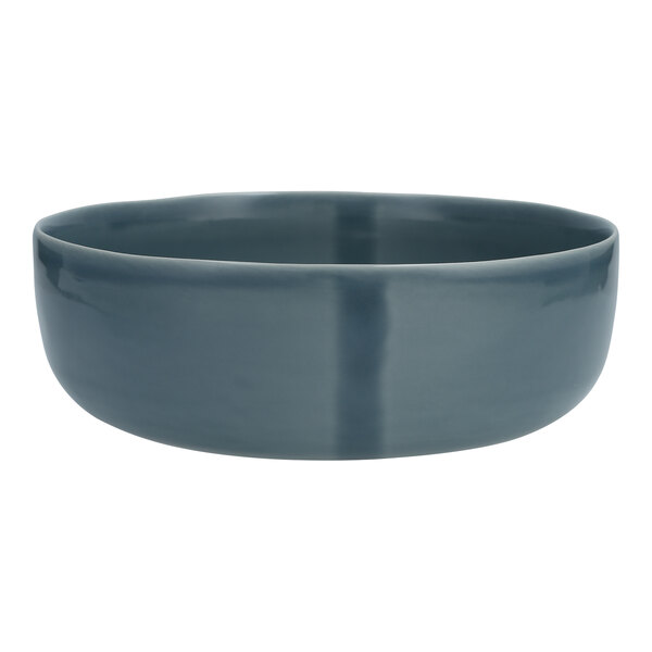 A deep blue stoneware bowl with a dark gray rim.