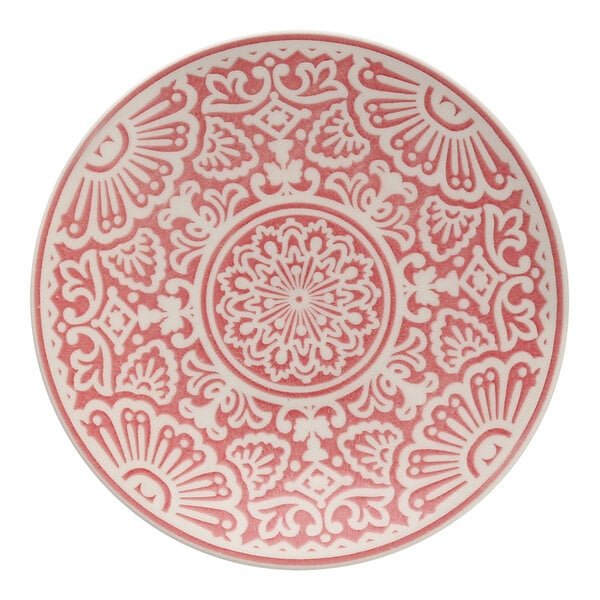 A Havana by Fortessa rose vitraluxe coupe plate with an intricate red and white design.