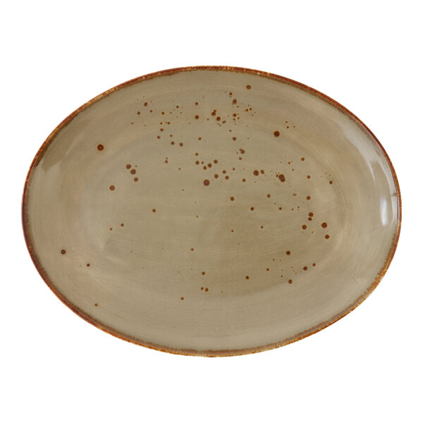 A close-up of an Erthe by Fortessa Shiitake TechnoCeram oval platter with brown spots.