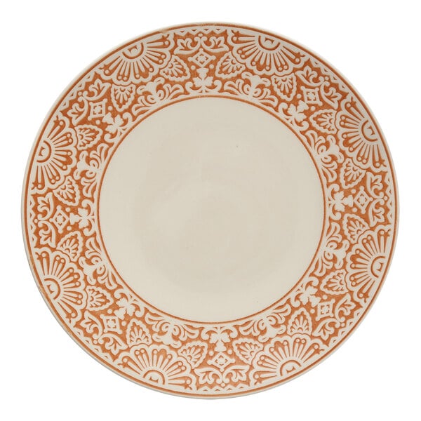 A white Havana by Fortessa coupe plate with an orange border design.