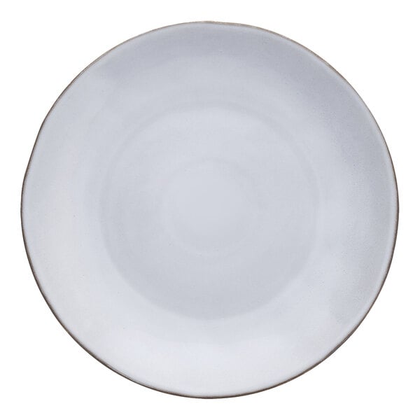 A white stoneware plate with brown borders.