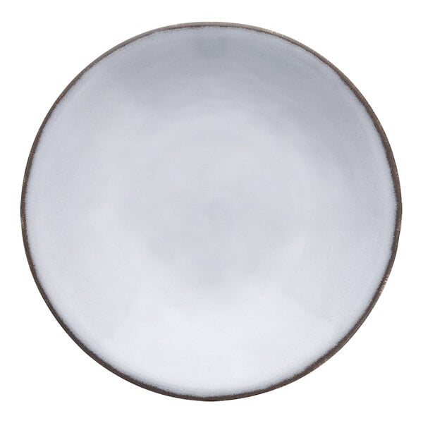 A white stoneware plate with a brown rim.