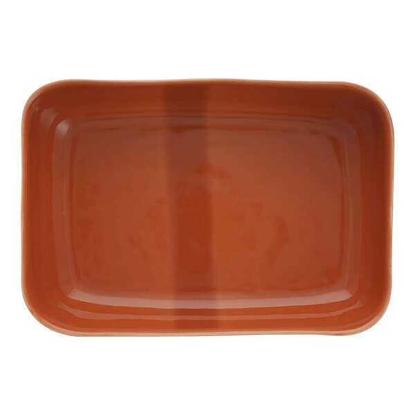 A brown rectangular Nosse by Fortessa stoneware baker with a brown rim.
