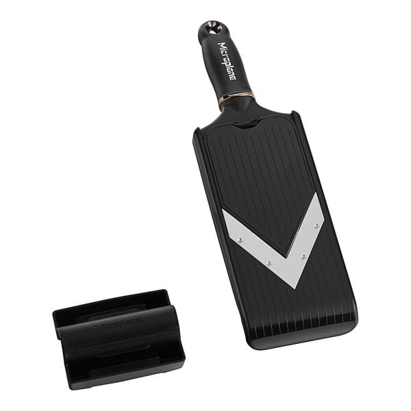 A black and silver Microplane Mandoline Slicer with a black handle.