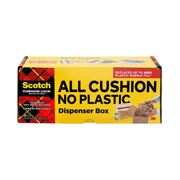 A yellow Scotch Cushion Lock paper wrap dispenser box on a counter.