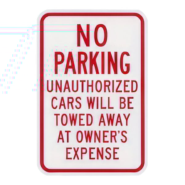 A white Lavex aluminum parking lot sign with red text and a red border reading "No Parking / Unauthorized Cars Will Be Towed Away At Owner's Expense"