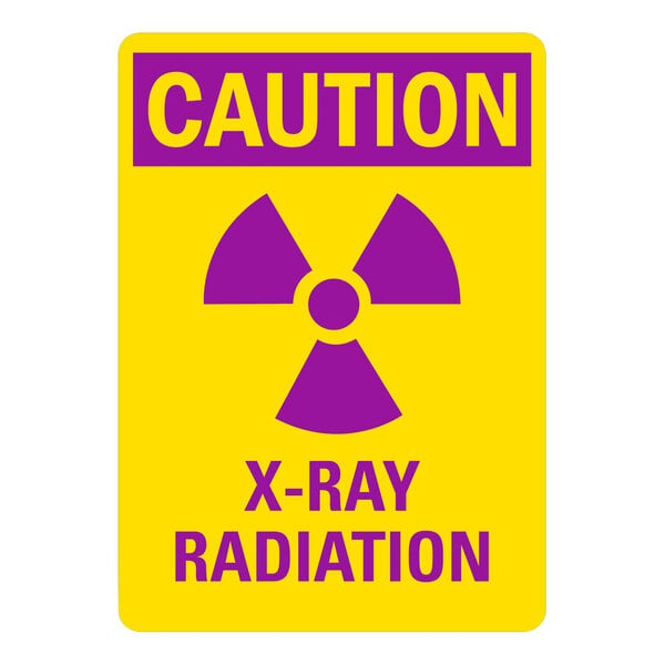 A yellow sign with purple "Caution / X-Ray Radiation" text.