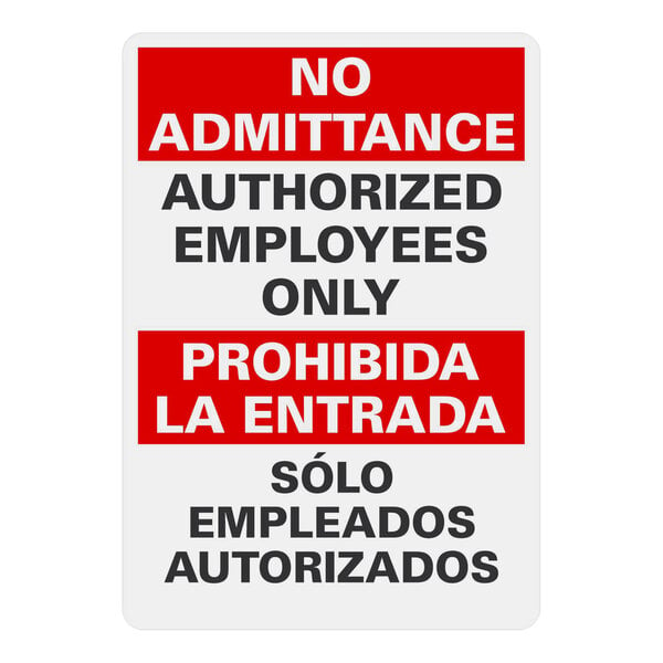 A white rectangular plastic safety sign with black and red text that reads "No Admittance / Authorized Employees Only" in English and Spanish.