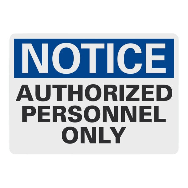 A white sign with blue and black text that reads "Authorized Personnel Only" in blue.