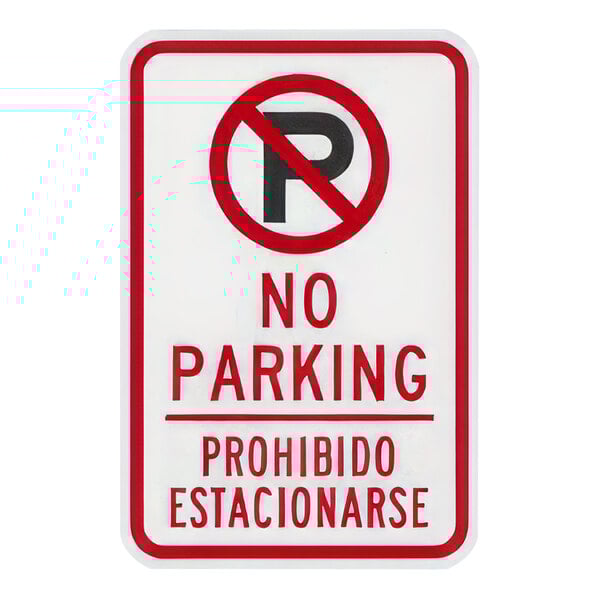 A white sign with red and black text that reads "No Parking" in English and Spanish.