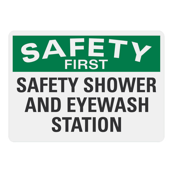 A white rectangular Lavex safety label with black and white text reading "Safety First" over a green safety shower and eyewash station icon.