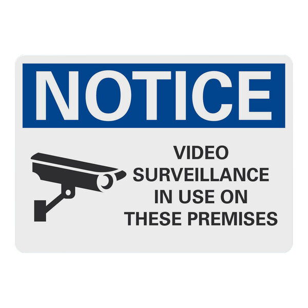 A white and blue Lavex reflective aluminum sign that says "Notice: Video Surveillance In Use On These Premises" with black text and a black and white camera icon.