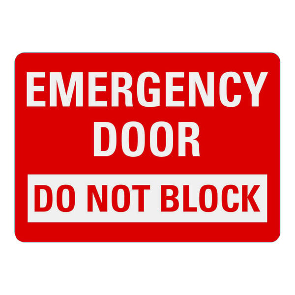 A white rectangular sign with red and white text that says "Emergency Door / Do Not Block"