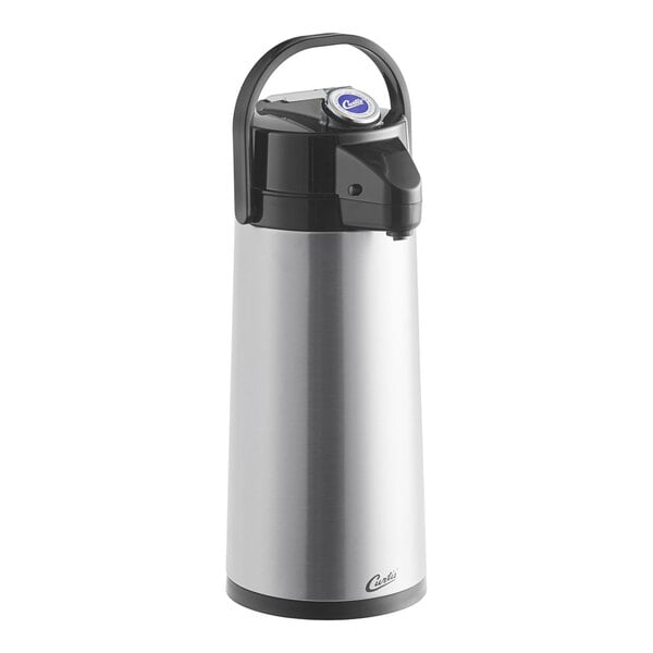 A close-up of a silver Curtis stainless steel airpot with a black lever and lid.