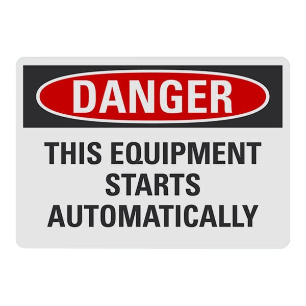 A white and black sign with red text that says "Danger / This Equipment Starts Automatically" above a black border.