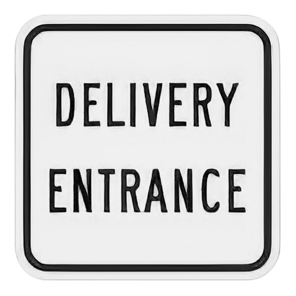 A white sign with black text that says "Delivery Entrance" in black.