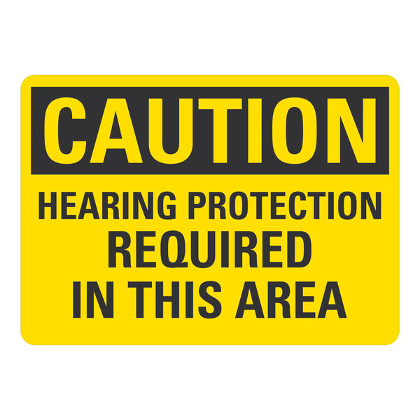 A yellow and black Lavex adhesive vinyl safety label that says "Caution / Hearing Protection Required In This Area"