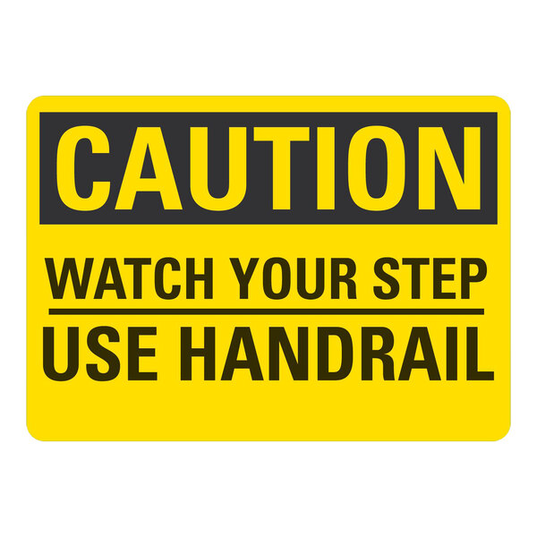 A yellow and black rectangular plastic sign that says "Caution Watch Your Step Use Handrail"