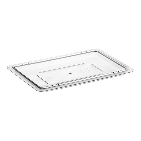 A clear polycarbonate food storage box lid on a clear rectangular container.