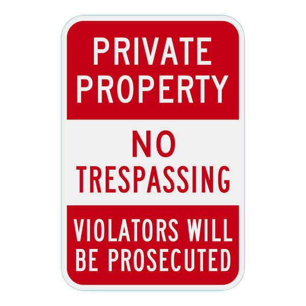 A white and red Lavex engineer-grade reflective aluminum sign that says "Private Property / No Trespassing / Violators Will Be Prosecuted"