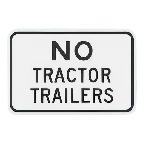 A white sign with black text reading "No Tractor Trailers" and a black circle with a diagonal line through it.