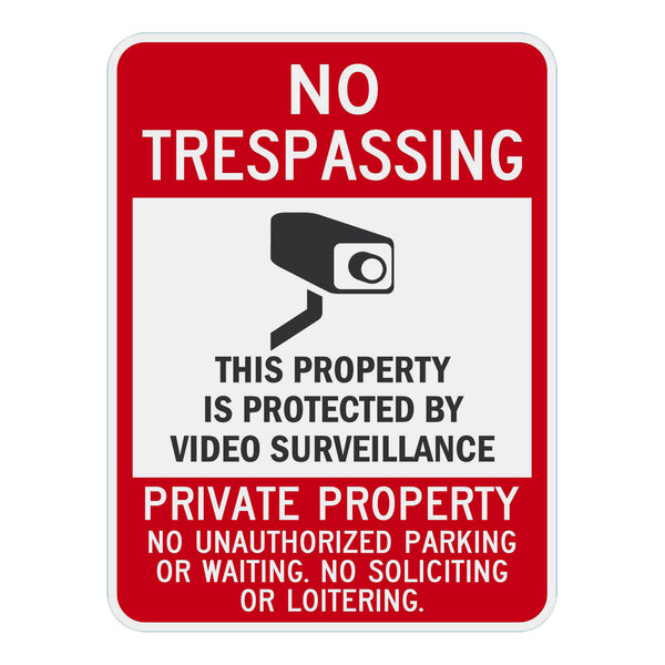 A red and white rectangular aluminum sign that reads "No Trespassing / This Property Is Protected By Video Surveillance / Private Property / No Unauthorized Parking Or Waiting / No Soliciting Or Loitering" in white lettering.