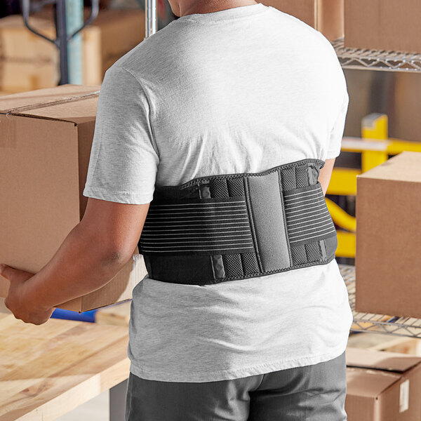 A man wearing a 3M Futuro back support belt.