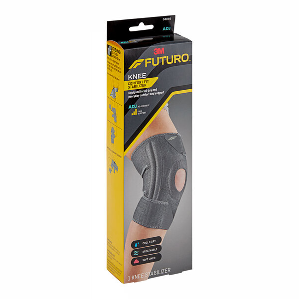 A black 3M Futuro knee stabilizer in a box.