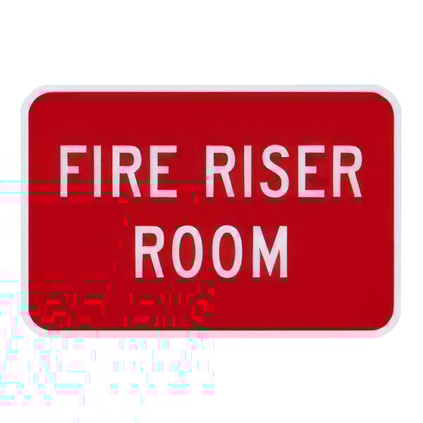 A red and white "Fire Riser Room" safety sign on reflective aluminum.