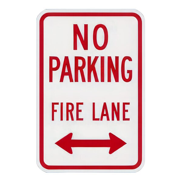 A white rectangular sign with a red border and red text reading "No Parking / Fire Lane" with a red stripe and arrow.