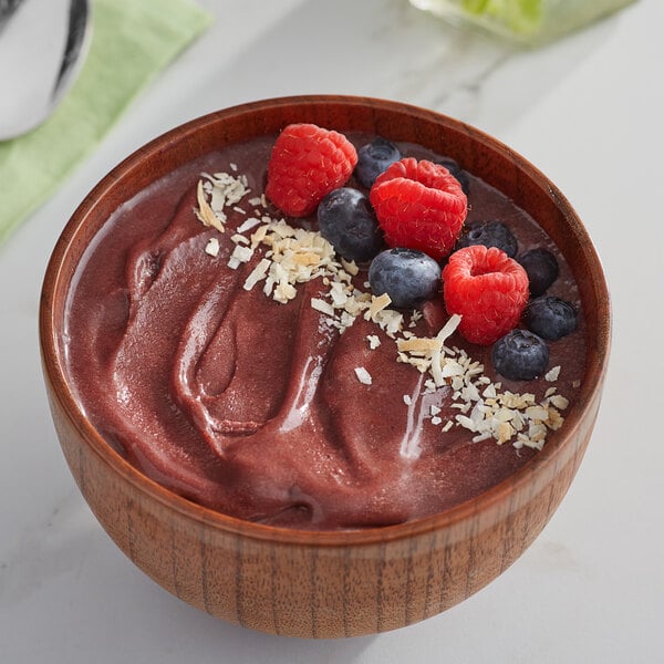 A bowl of Makai Acai sorbet with berries.