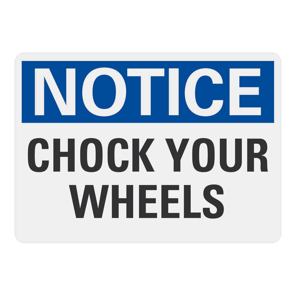 A blue and white sign with black text that says "Chock Your Wheels"