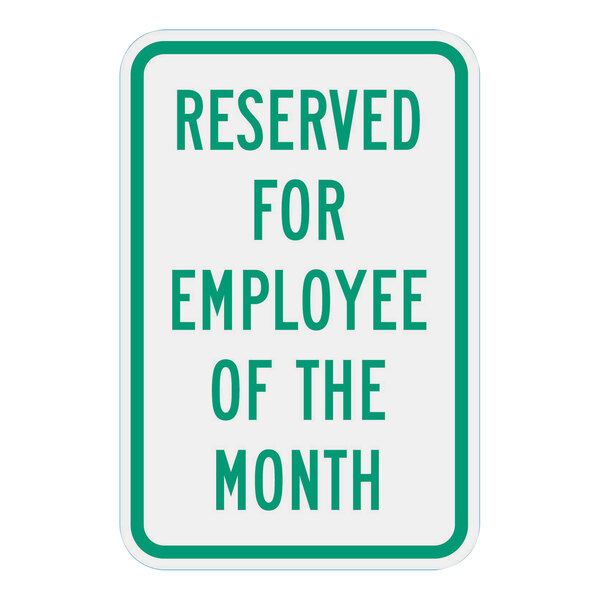 A white sign with green text that says "Reserved For Employee Of The Month" and has a green border.