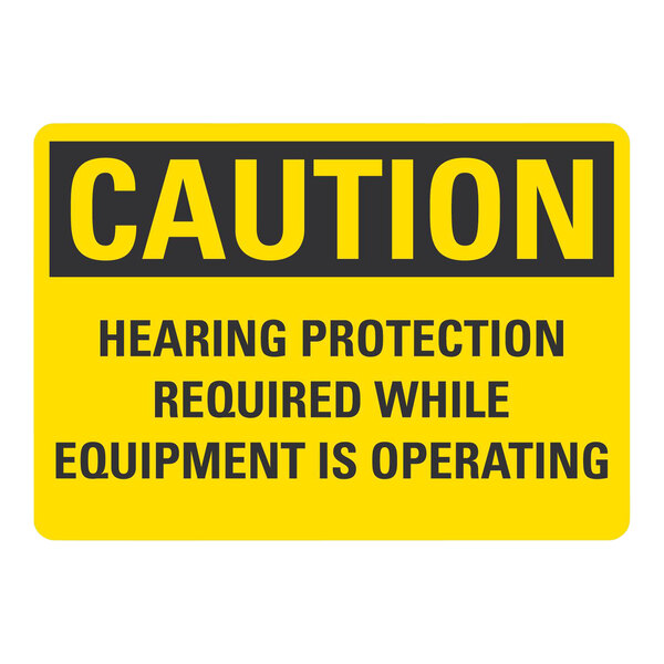 A yellow and black Lavex aluminum safety sign that says "Caution / Hearing Protection Required While Equipment Is Operating"